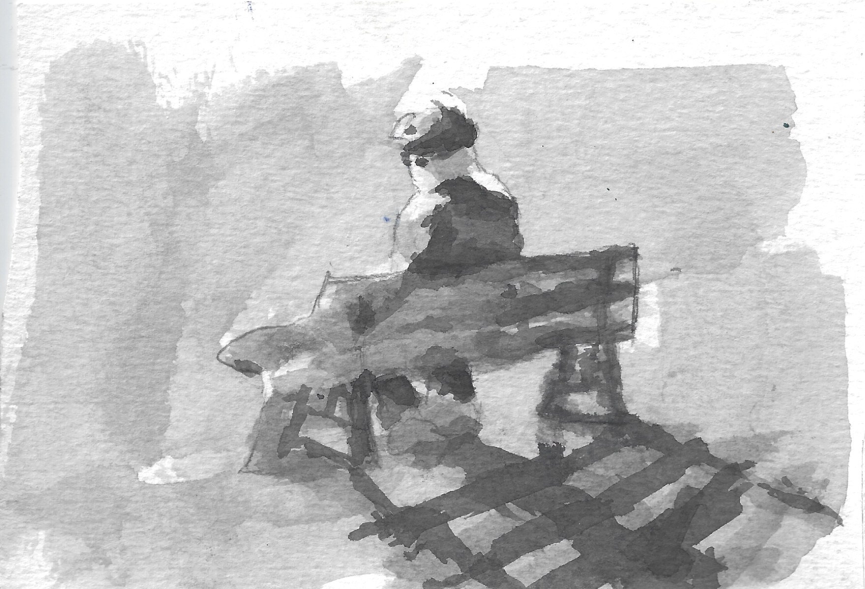 איש על ספסל או מסילה